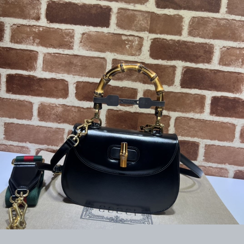 G*u*i top handle bags
